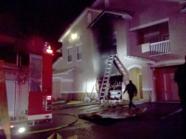 Car Catches Fire In Apartment Garage